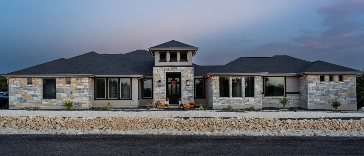 Home exterior during daylight with the permanent lighting system concealed