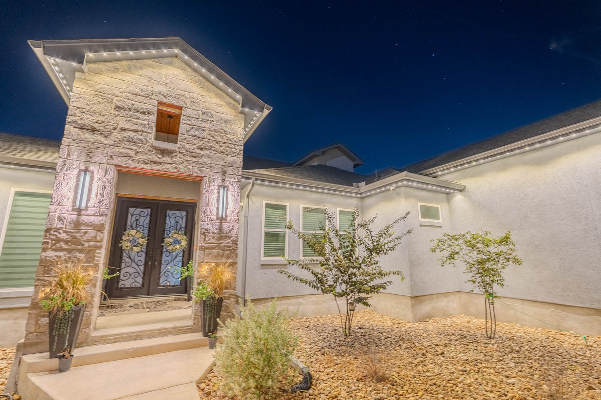 A refined residential lighting scene after sunset