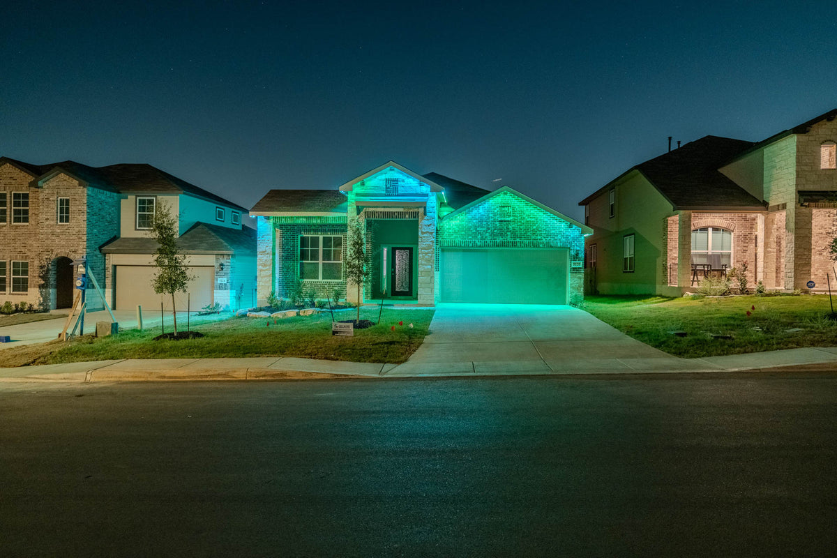 Subtle warm white lighting integrated into a home exterior